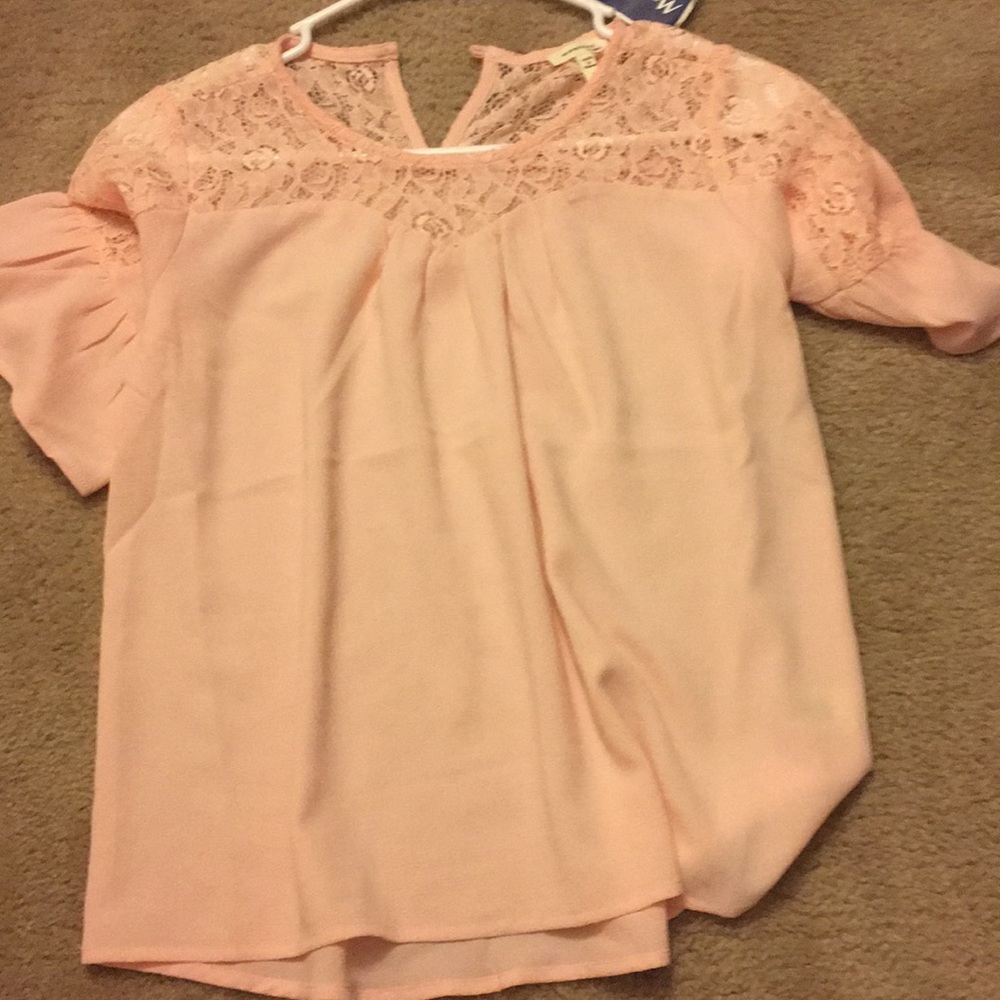 Baby pink top with lace detailing